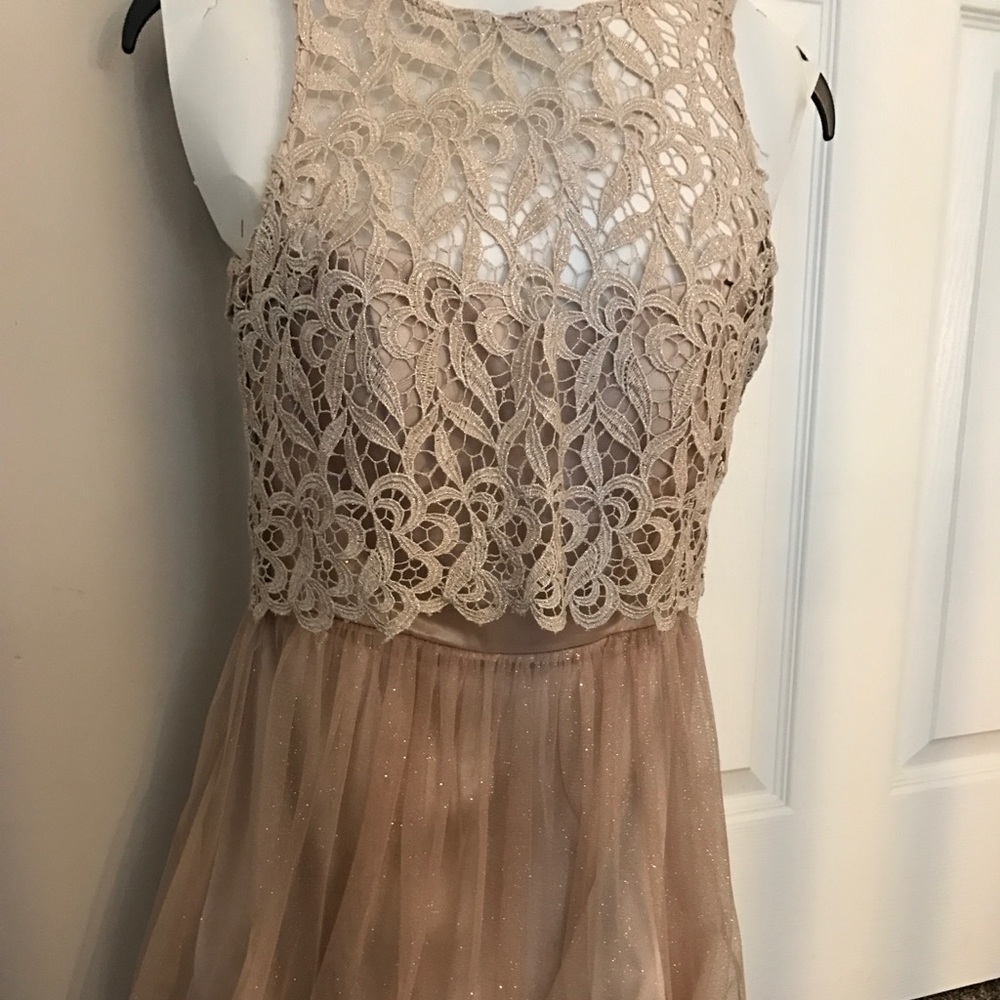 A short, one-of-a-kind champagne prom dress!